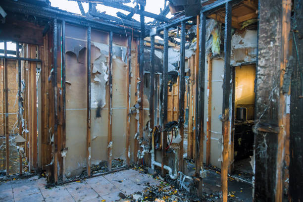Professional Fire Damage Restoration technician working in Ironwood, MI